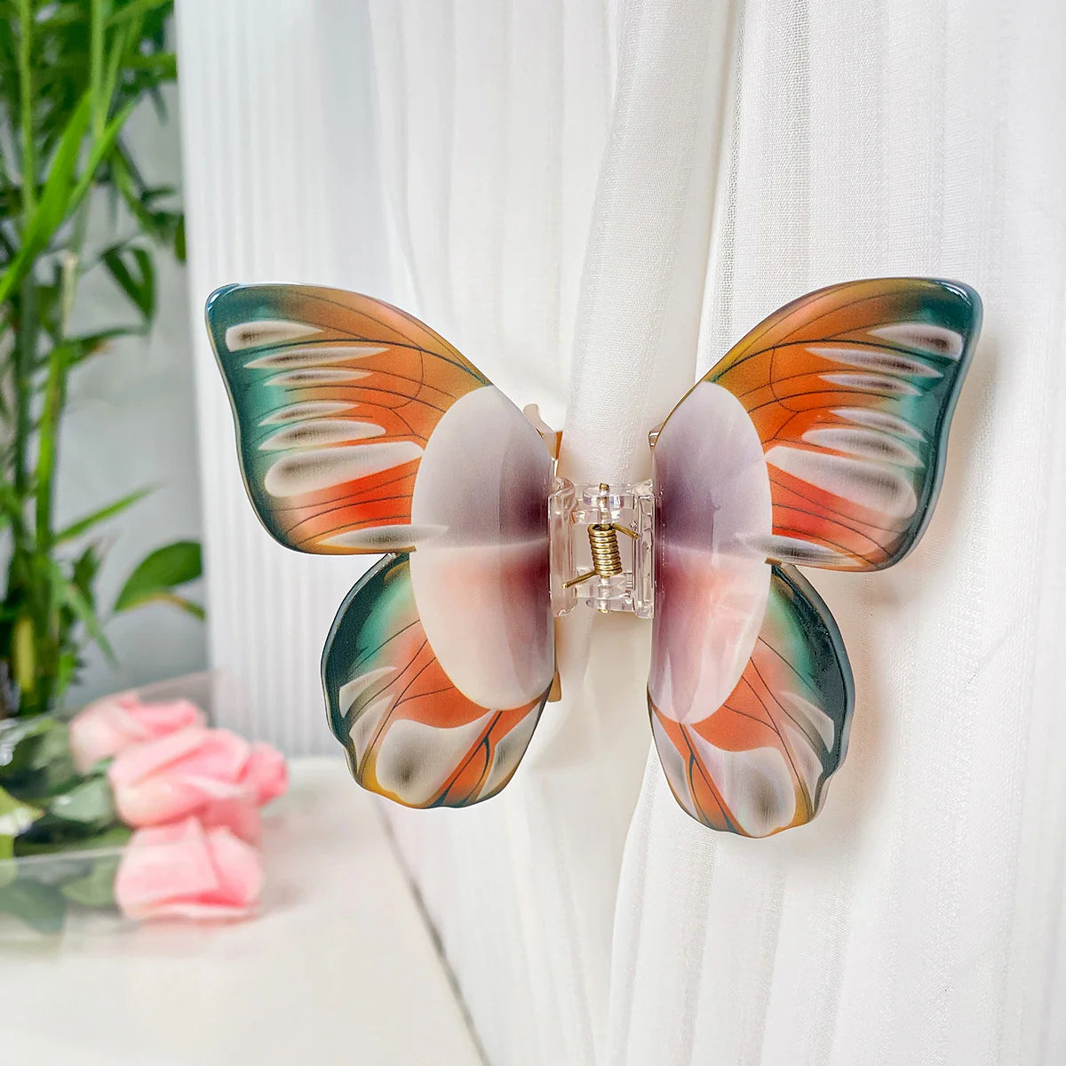 Pince Papillon orangé