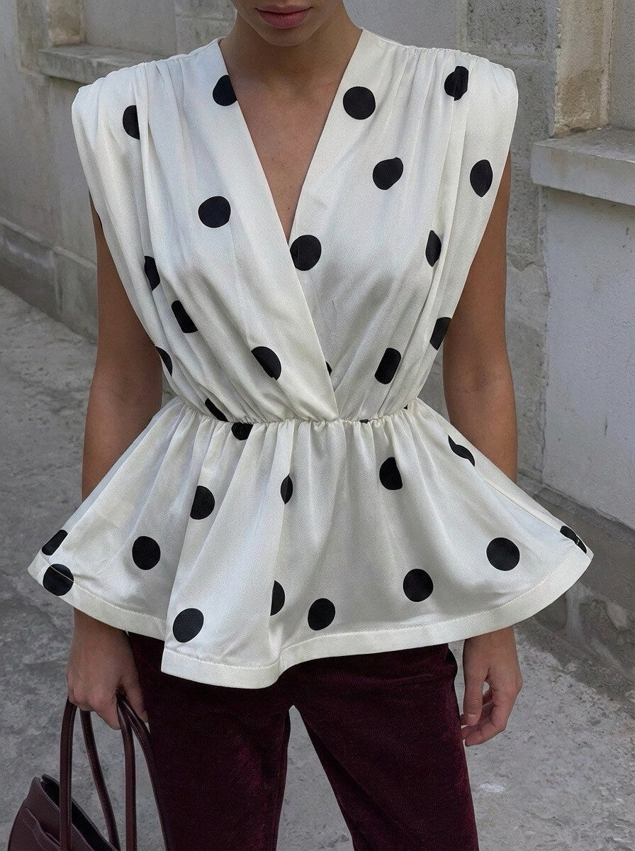 Top péplum à pois
