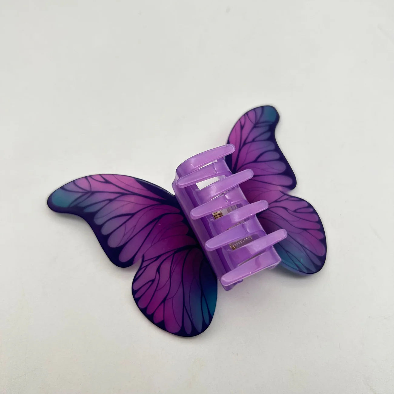 Pince Papillon violet