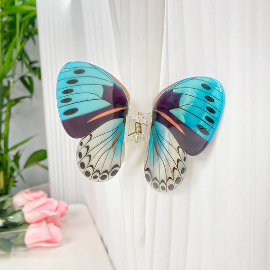 Pince Papillon bleu