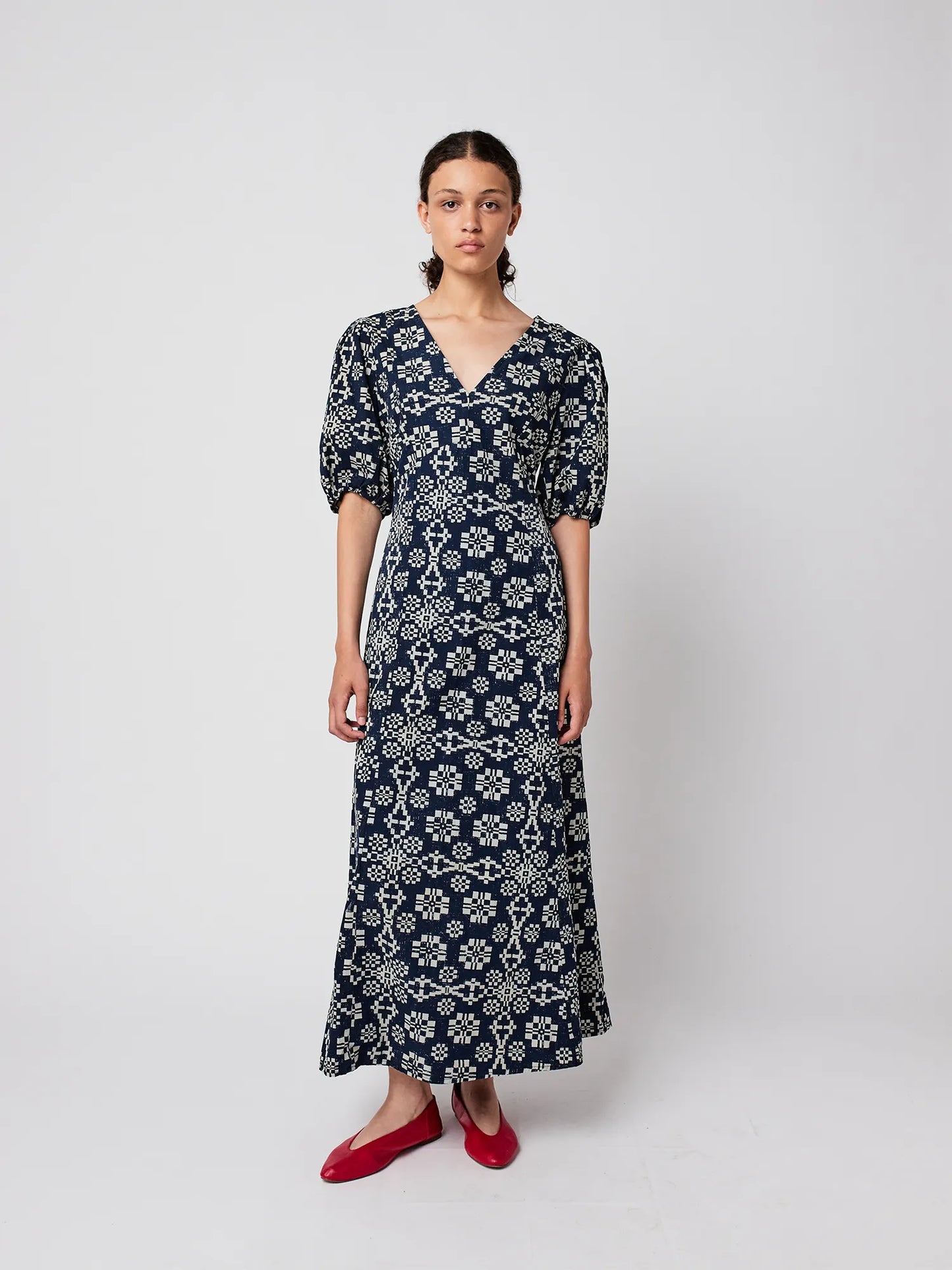 Robe à col en V évasé à motif kaléidoscope