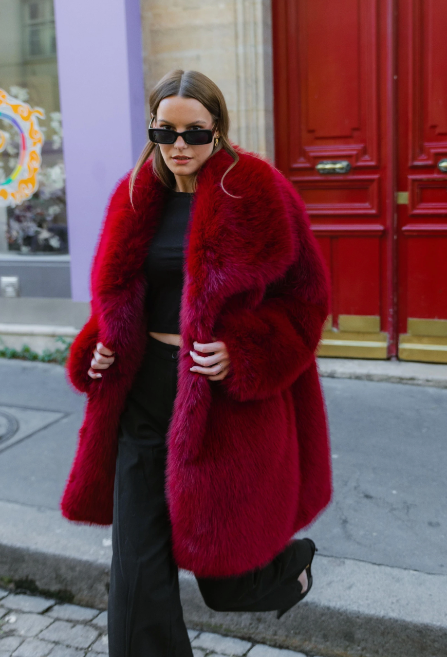 Manteau mi-long en fausse fourrure
