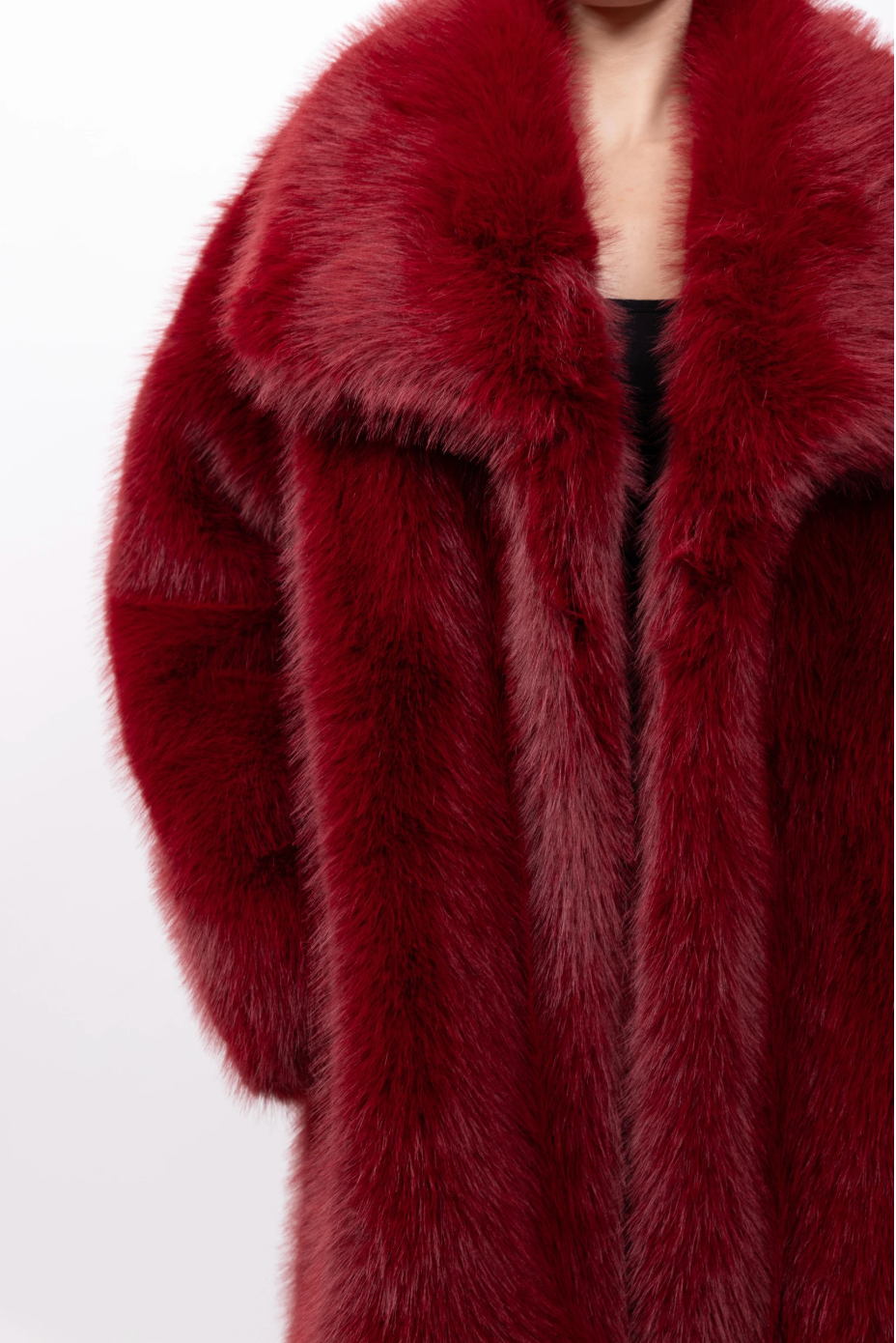 Manteau mi-long en fausse fourrure