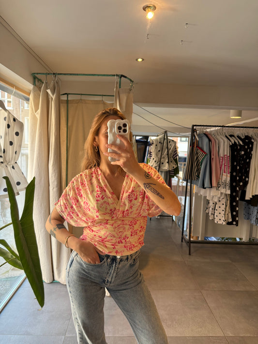 Blouse drapé à motifs floraux